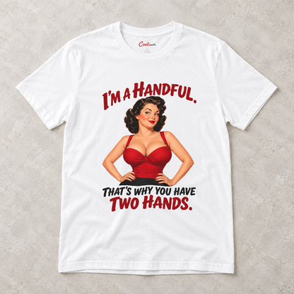 White Cooliooli T-shirt with the “I’m a handful. That’s why you have two hands.” pin-up design, front flat lay