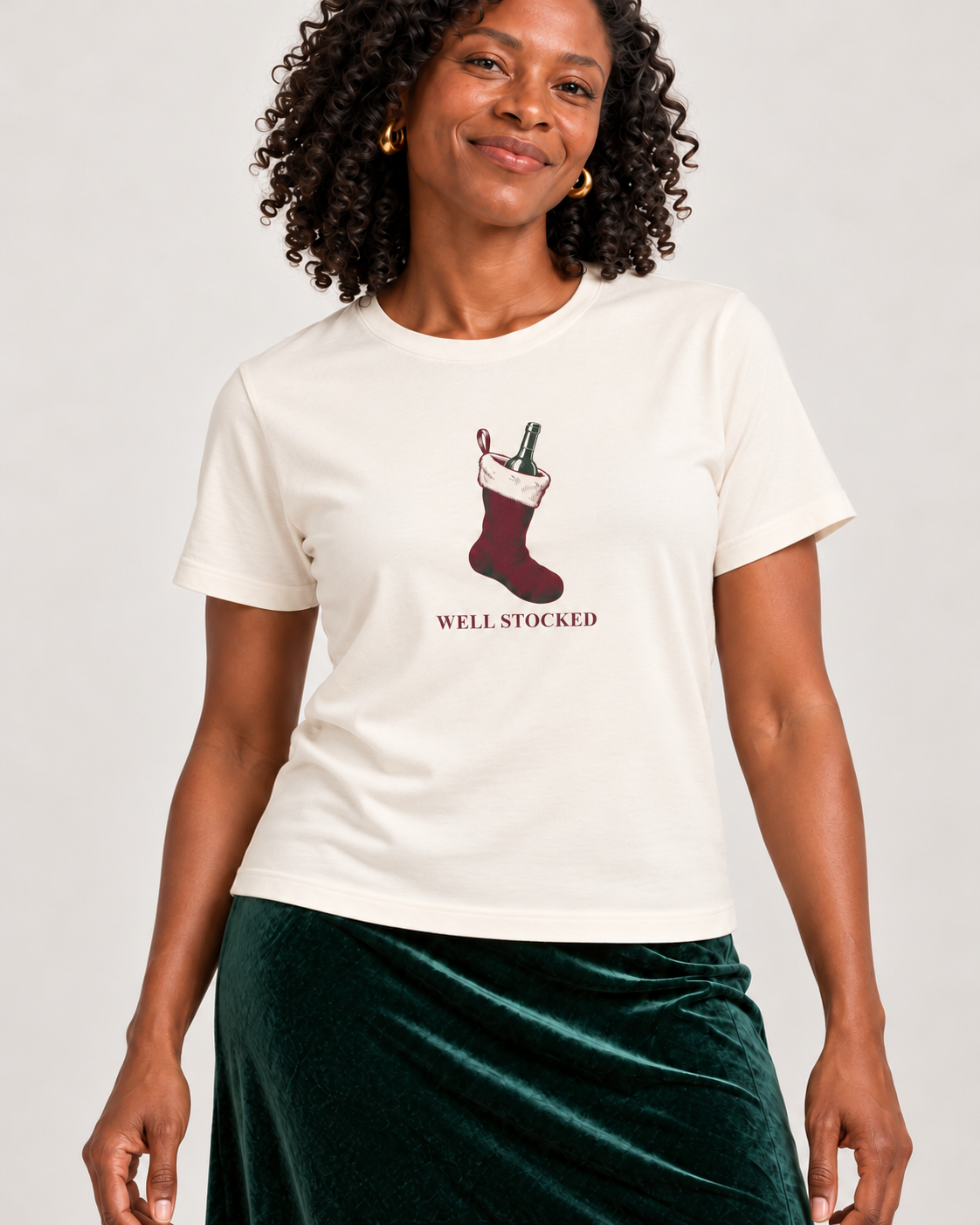Close view of WELL STOCKED wine-stocking print on the Natural Bella+Canvas 6400 women’s relaxed-fit tee.