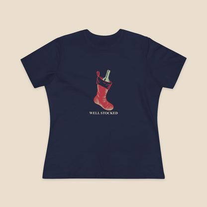 Well Stocked wine-stocking Christmas graphic on a Navy Bella+Canvas 6400 women’s relaxed-fit tee; front colour preview.